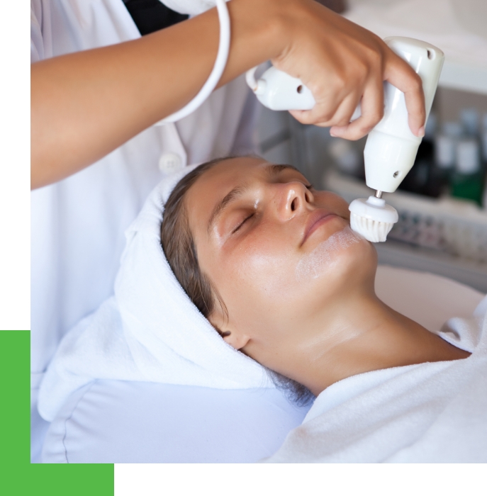 A woman amidst an acne treatment procedure