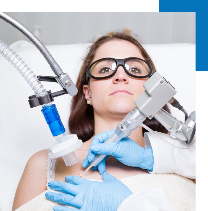 A female patient undergoing a wart removal procedure.