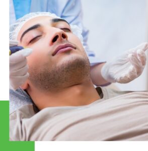 A male patient undergoing a laser acne treatment in a cosmetic skin care clinic.