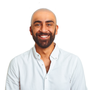 A trimmed photo of a happy bald man ready for hair treatment at AKJ Skin & Laser Clinic, Tirunelveli.